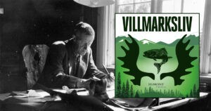 Mikkjel Fønhus i arbeid ved skrivebordet.